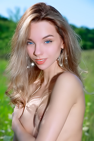 Josephine Jane Thighs Parted To Expose The Delicate Contours Of Her Shaved Pussy