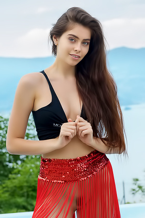 Foxy Alissa Letting The Long Red Fringes Of Her Skirt Fall Away To Expose Her Sexy Ass