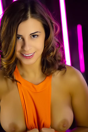 Alice Kelly Voluptuous Beauty Tugs At Her Vibrant Orange Bodysuit