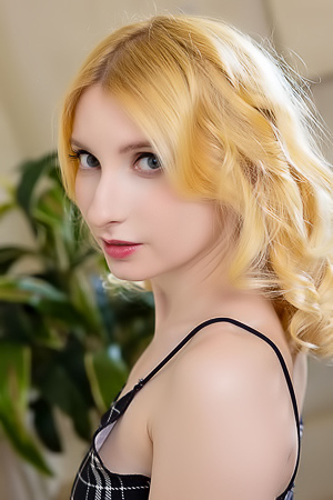 Minnie Lighter Squeezing Her Gorgeous Breasts And Smiles Seductively