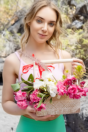 Oxana Chic Shows Off In Crop Top Gathering Flowers, Teasing View Under Shorts